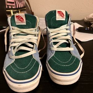 Size 7 high top multicolored Vans.